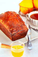 Fresh baking delicious orage loaf cake with syrup