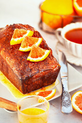 Fresh baking delicious orage loaf cake with syrup