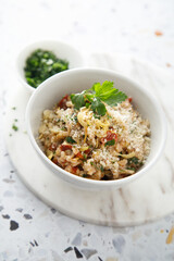 Savory oatmeal porridge with tomatoes and cheese