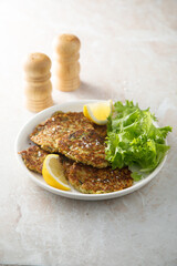 Zucchini fritters with lemon