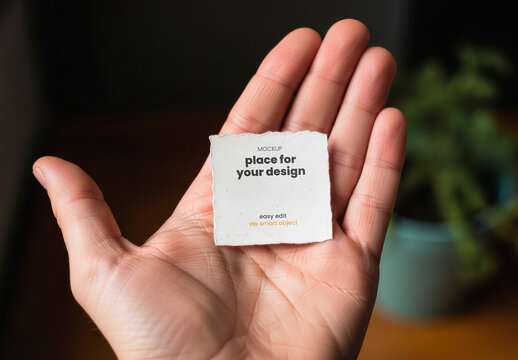 Square Piece of Paper on Open Hand Mockup