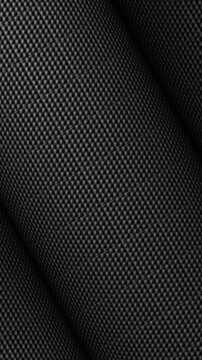 Black Patterned Foam Acoustic Tile Texture in Continuous Rolls Rotation as Unique Soundproof Background
