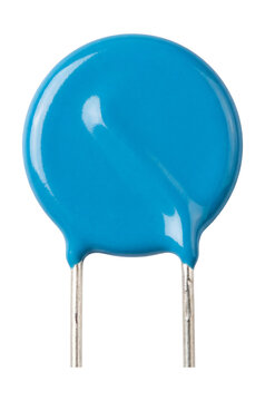 Small disc-shaped varistor with radial leads.