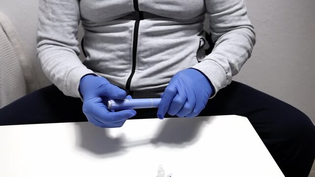 Man preparing semaglutide injection for weight loss and diabetes.