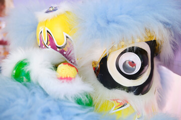 Close-up view of a Chinese lion's head.