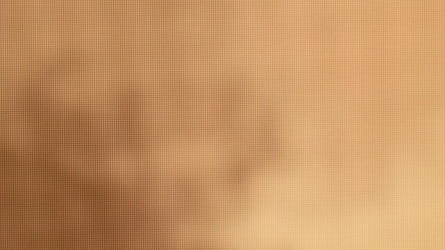 Blurry Brown Shadows on Light Brown Background Texture