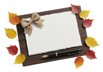 Autumn leaves on wooden background with book and scrapbook design elements
