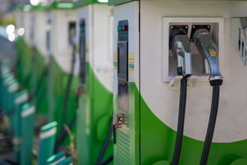 Public electric car charging stations in a row.