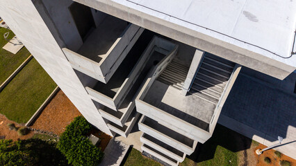 Aerial view looking down at outdoor stairs in modern concrete building 