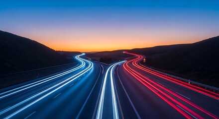 Long exposure shot of highways splitting towards colorful horizon at dusk