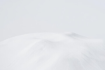 Fototapeta premium Powdered sugar, white ground background and texture