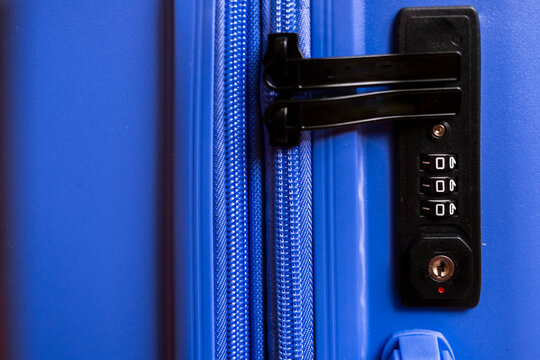 Luggage lock security with blue zipper focus