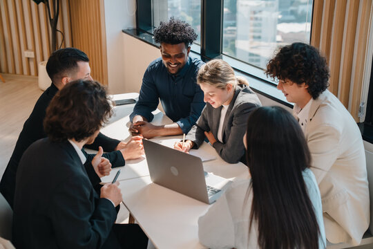 Business Presentation of Marketing Plan and Data Analysis in Modern Office, Young Professional Presenting Strategy, KPI Metrics and Project Workflow to Team During Corporate Meeting