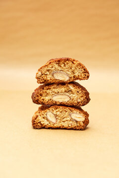 Almond biscotti stack on beige background