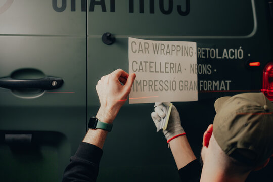 Vehicle branding and customization process in workshop