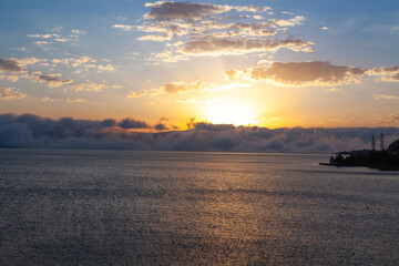 the beautiful sunset and the sun in the sea.