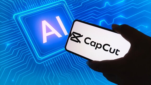Hand holding smartphone with CapCut app and AI technology background