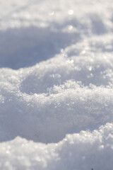 Fluffy white snow on a winter day