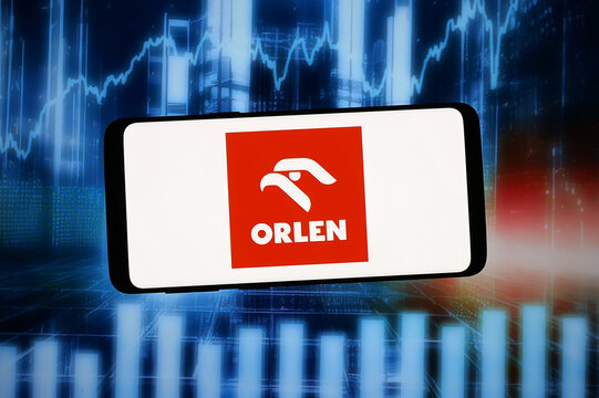 Stuttgart, Germany - 02-09-2026: In this photo illustration, the logo of Polish petroleum company Orlen S.A. is displayed on a smartphone in front of abstract background on computer screen.