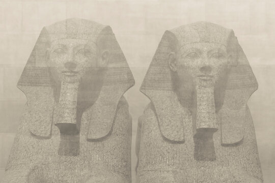 New York City, New York,  Double exposure of stone pharaoh head. 
