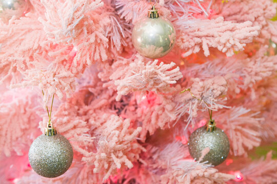 Palm Springs, California, USA.  Pink flocked christmas tree with white ornaments