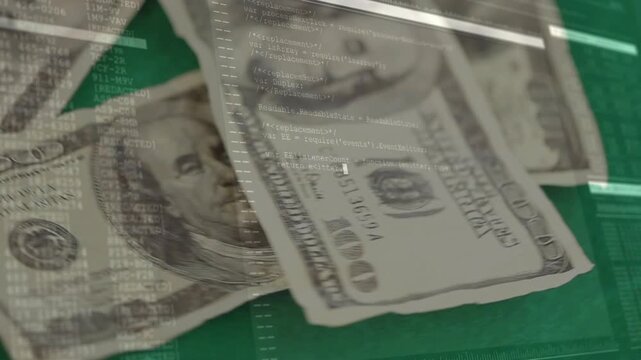 Monitor code flashing, US $100 bills sliding and fanning across green felt, revealing poker chips