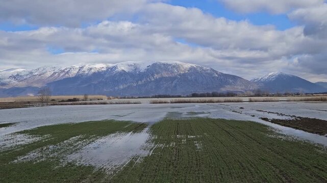 Lake Landscape Prespa, Albania. Prespa lake with Maligrad island surrounded by water and mountains in Balkans 02/20/2026