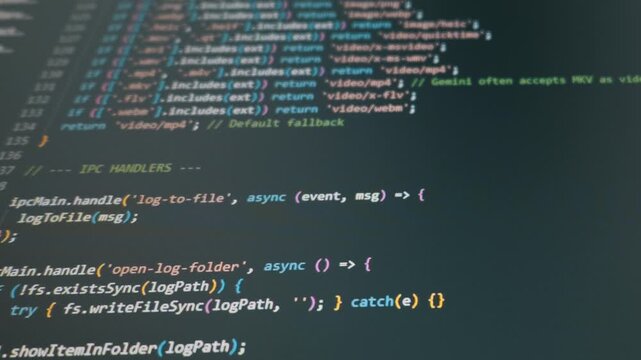 Detailed view of colorful JavaScript lines scrolling on a black screen for backend application logic. Concept of secure coding, software engineering, debugging, and digital innovation.