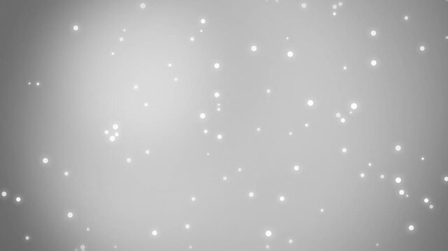 A simple gray gradient background animation with sparkling dots, creating a smooth transition effect in a digital environment