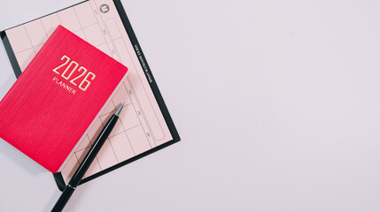 2026 planner calendar pen organization schedule planning desk workspace office time management appointment datebook diary note taking productivity © JK_kyoto