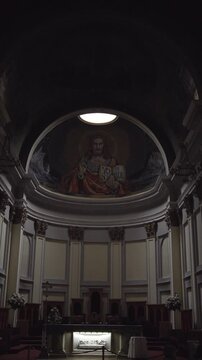 Vertical View of Cathedral Interior with Jesus Christ Mural and Altar, Interior Architecture of a Catholic Basilica featuring Altar and Christ Icon