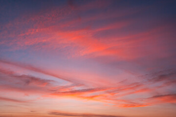 Beautiful colorful sunset with orange clouds. Sky background.