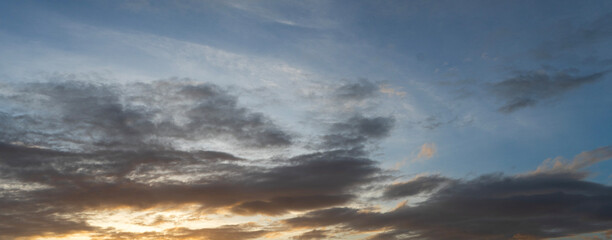Beautiful colorful sunset with orange clouds. Sky background.