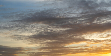 Beautiful colorful sunset with orange clouds. Sky background.