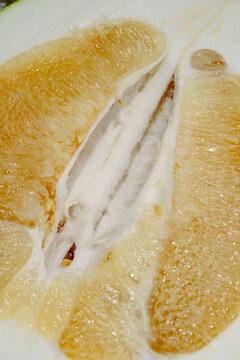 Close-up of sliced pomelo fruit segment