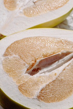 Creative close-up of a pomelo slice in a modern art style