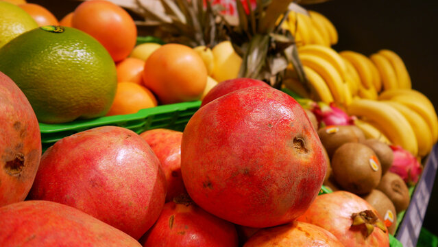 A variety of ripe delicious fruits on a market stall