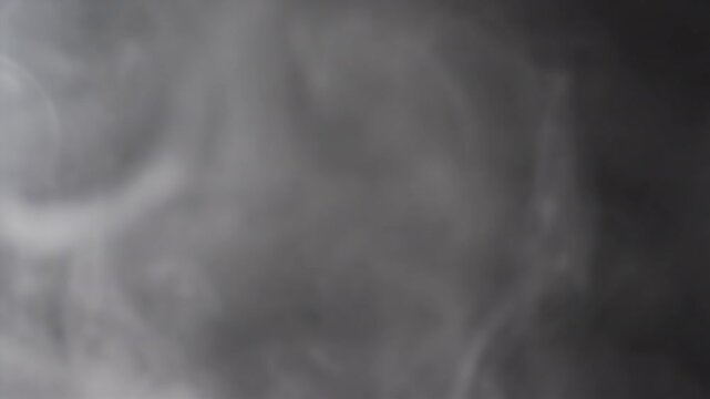 A mesmerizing set of captivating smoke patterns that are creating an enigmatic and intriguing atmosphere