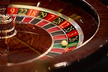 Roulette Wheel with Ball in Luxury Casino