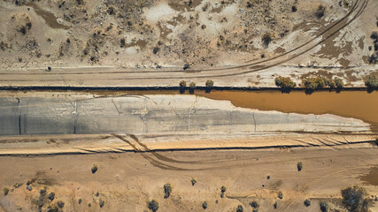 Fototapeta premium Aerial Flooded Road and Desert Landscape Top Down in Yermo California