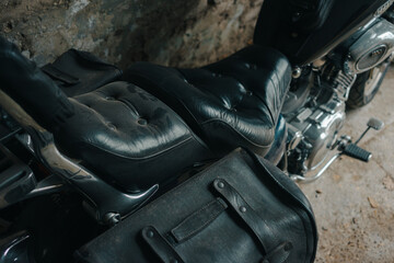 A large motor parked in the passage of an old building