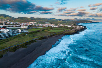 Aerial view of the desert black sand beach on Atlantic Ocean, coast of island of Azores