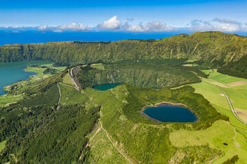 Sete Cidades caldera with crater lakes and steep rim slopes on Sao Miguel Island, drone view