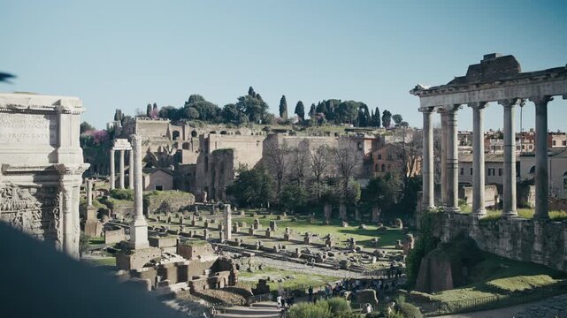 An establishing shot of the Roman Forum during the day. Rom, Italy.