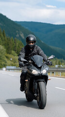Obraz premium Male motorcyclist riding black sports bike on mountain road