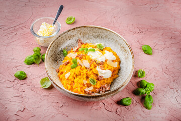 Risotto allo zafferano e prosciutto - traditional saffron risotto alla milanese with prosciutto...