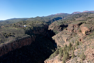Fototapeta premium Aerial view of El Río volcanic gorge and mountains, Tenerife, Canary Islands, Spain