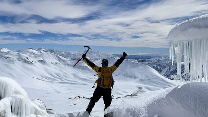 Winter Climbing Success Concept In Frozen Mountain Landscape