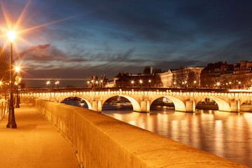 The Pont Neuf is the oldest standing bridge across the river Seine in Paris, France