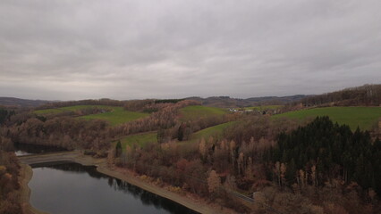 Autumn Lake Aerial View with Soft Light and Rolling Landscape